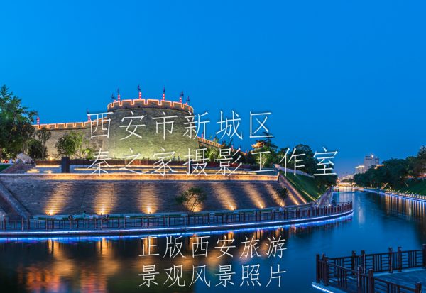 夏天傍晚的中国陕西西安市中心明城墙西南角与环城公园护城河景观